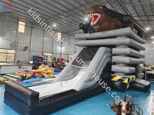 Nouveau design de château gonflable avec diapositive sur le thème du dinosaure commercial